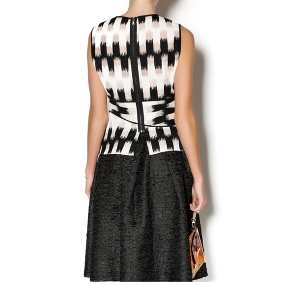 BCBGMAXAZRIA Jolyne Peplum Tank Top with bold, white and black striped color - Picture 4 of 8